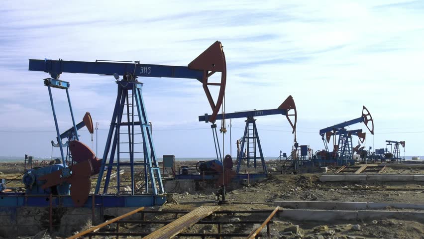 Caspian Sea shore, oil pumping Royalty-Free Stock Footage #1024529330