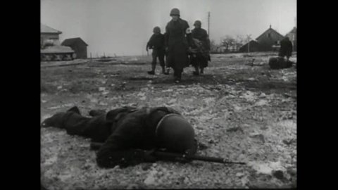 CIRCA 1940s - A group of American paratroopers fight German forces in Holland during World War 2