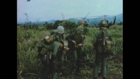 CIRCA 1966 - A group of soldiers are re-located and set up camp in a new location in Vietnam during the Vietnam War