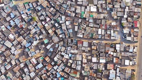 GUGULETHU, SOUTH AFRICA - CIRCA 2018 - Straight down high aerial over ramshackle township of Gugulethu, one of the poverty stricken slums.