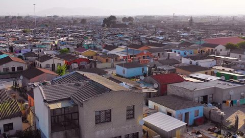 SOUTH AFRICA - CIRCA 2018 - Aerial over Gugulethu, one of the poverty stricken slums, ghetto, or townships of South Africa.