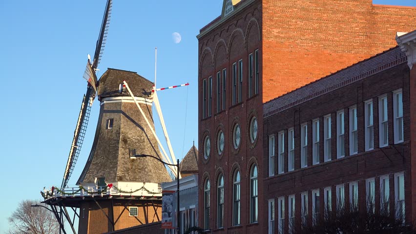 PELLA, IOWA - CIRCA 2018 - The quaint all American street in Pella, Iowa with a windmill visible.