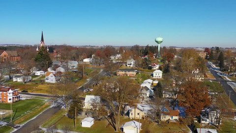 RIVERSIDE, IOWA - CIRCA 2018 - A drone aerial over a small town in America in winter snow, Riverside, Iowa.