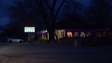 CALIFORNIA - CIRCA 2018 - Establishing shot at night of a country style roadside cafe or restaurant.