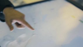 Man using interactive touchscreen display at urban exhibition - scrolling and touching. Entertainment and technology concept - Powered by Shutterstock - Get 15% off with code: PIKWIZARD15