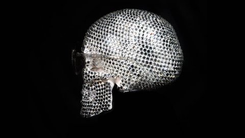 amazing diamond covered skull with sunglasses rotating. this is a unique handmade object from our studio