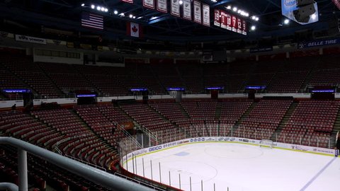 Detroit, Michigan / USA - 12282013: Empty Ice Arena Wide Panning Shot