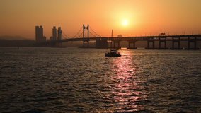 Video, Gwangandaegyo Bridge and the boat are running, Busan Bridge and the sunset.