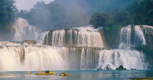 Beautiful waterfall. Ban Gioc waterfall or Detian waterfall is landmarks name of two waterfalls in border Cao Bang, Vietnam and Daxin County, China. Stock video footage  Amazing landscape for travel