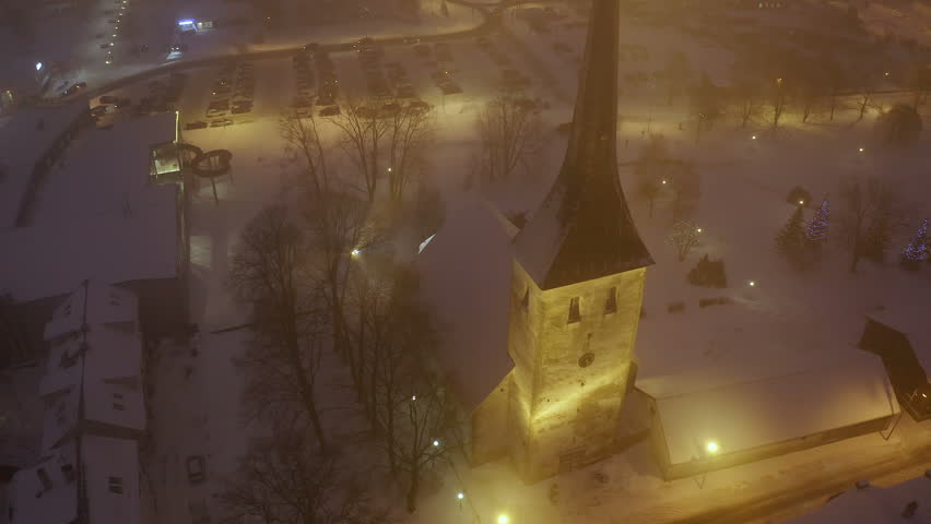 The top view of the church in Rakvere Estonia filled with thick snow on the ground