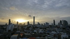 BANGKOK, THAILAND - September 18, 2018 : Timelapse Bangkok Cityscape of modern office business at sunset