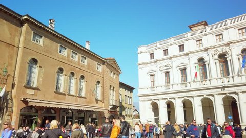 Bergamo, Italy - Feb, 2019: View of piazza Vecchia in Bergamo, Italy. The square is located in the center of the upper city, that is in the part enclosed by the Venetian walls.