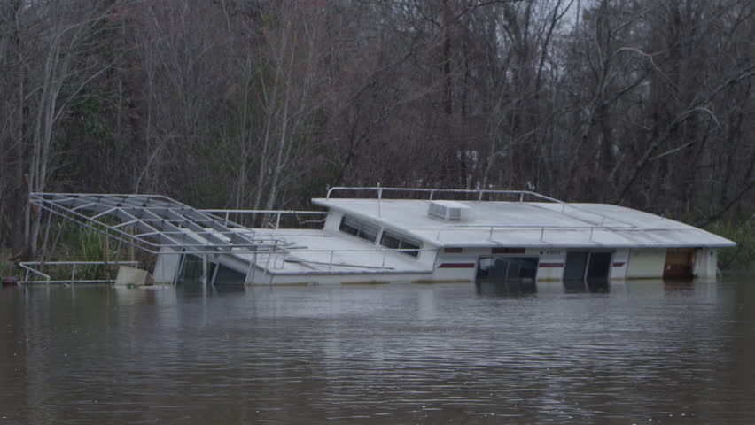Sunken ships and ruined debris from hurricane damage tropical storms in new orleans