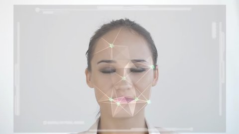 Futuristic and technological scanning of the face of a beautiful woman for facial recognition and scanned person. Example of an granted access. slow motion. 3840x2160