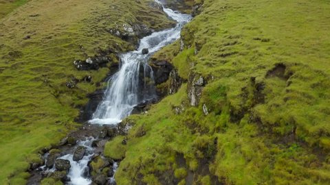 Aerial Forward Up: Waterfalls on Top of Mountains of Faroe Islands