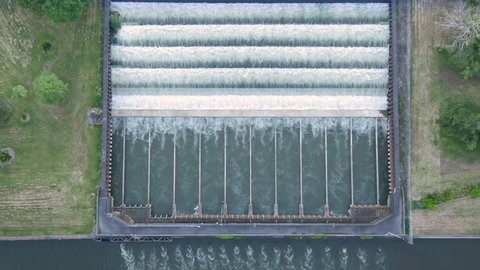 Aerial: Water cooling section of a coal powered Power Station. The water runs into the Waikato River. Huntly, New Zealand 