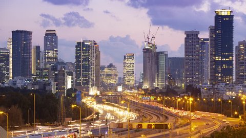 Tel Aviv Skyline and Ayalon Freeway At Time Lapse, Sunset,  From Day to Night, Israel 