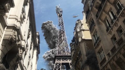 Paris Eiffel tower under attack
Powerful Video Compositing simulates real video footage with visual effects elements of Paris Eiffel tower Destroyed after attack with smoke debris and Helicopter 
