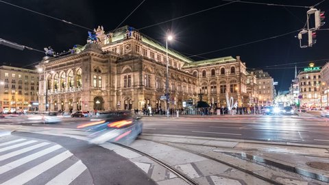VIENNA WIEN - AUSTRIA - JANUARY 2019: Timelapse of Vienna Wien Opera House at night with traffic