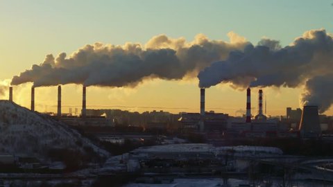 Air pollution smog sunrise city by Coal Power Plant
