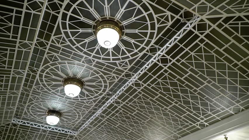 Decorated glass roof top in a building at night