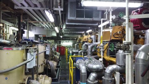 ABERDEEN, UK - JANUARY 15, 2019: Inside of an engine room of an offshore drilling rig for oil and gas drilling.

