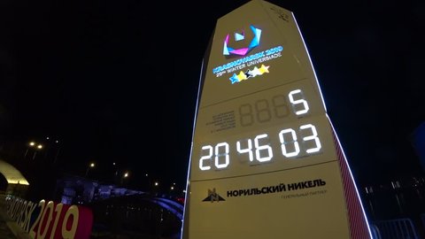 Krasnoyarsk, Russia - February 24, 2019: Timer  Winter Universiade Krasnoyarsk 2019, watches located on the embankment of the Yenisei River. Shooting at night.