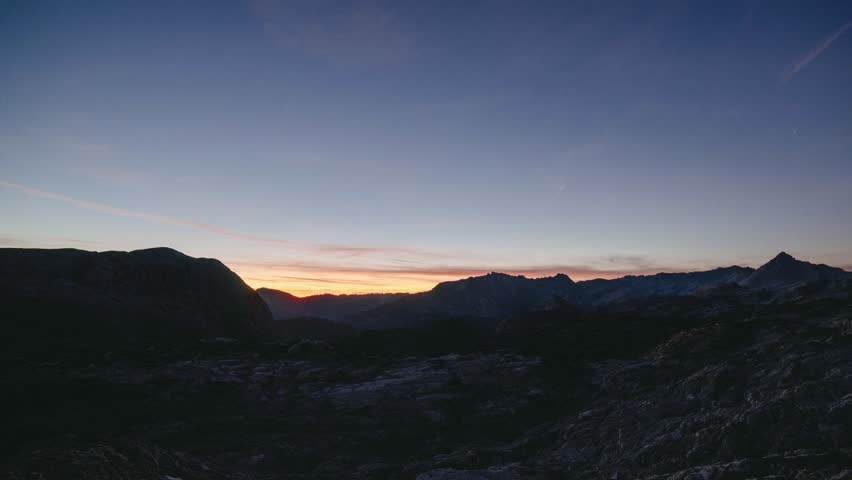 A beautiful sunrise in the Austrian Alps close to Bavaria Germany. The Steinernes Meer at berchtesgarden and Kärlingerhaus and Ingolstädter Haus  in the Northern Limestone Alps. 4K time-lapse