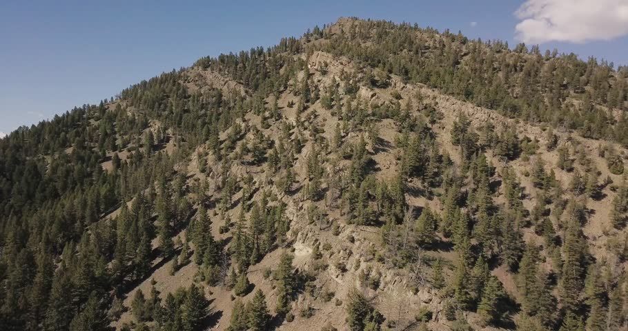 Stunning Bridger range green rocky mountains in southwestern Bozeman Montana countryside
(drone shot)