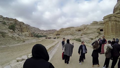 PETRA, JORDAN - circa JAN, 2017:  People in ancient Petra - historical and archaeological city in Hashemite Kingdom of Jordan