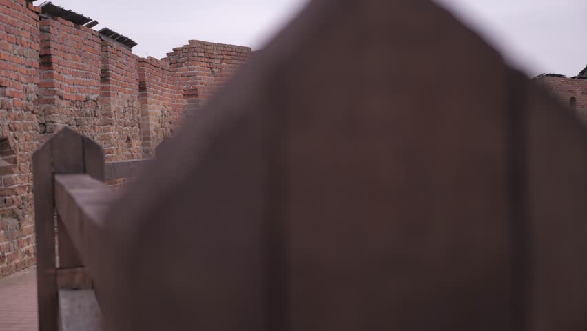 Girl walks along the fortress Ukraine Lutsk 2019