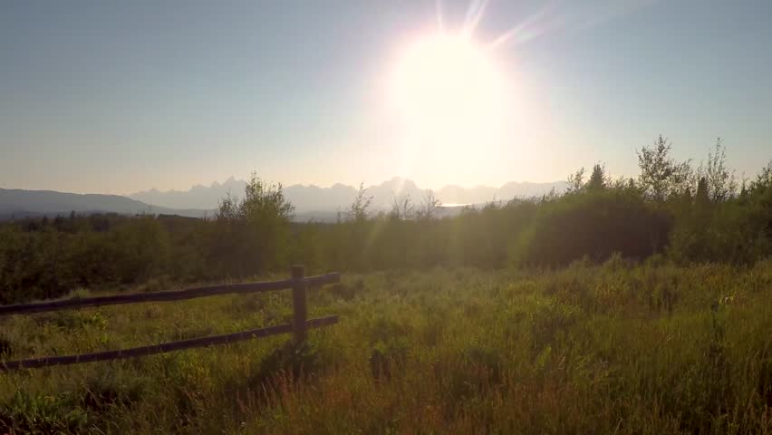 A beautiful time lapse sunset framing the Grand Teton Peaks near Jackson Wyoming.