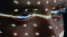 Biometric Facial Recognition Scanning of Blue Eye's Iris. Futuristic Concept: Projector Identifies Individual by Illuminating Face by Dots and Scanning with Laser. Close-up Shot - Powered by Shutterstock - Get 15% off with code: PIKWIZARD15