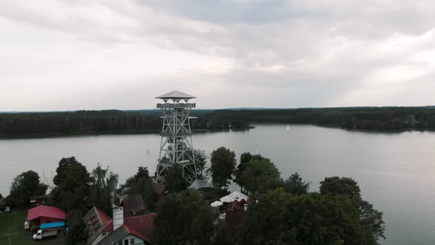 Aerial shot of Wdzydzki Park Krajobrazowy in Kaszuby, Poland with view of observation tower in Wdzydze Kiszewskie.