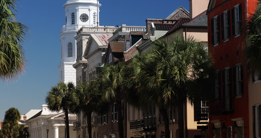 Row of old historic downtown business buildings and Saint Michael