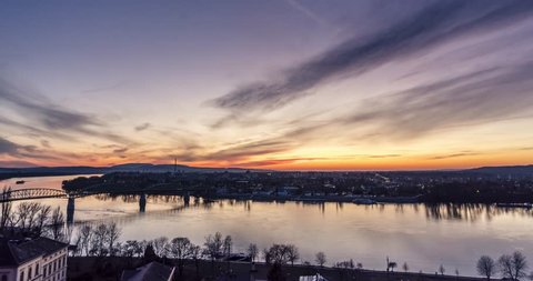 4K time lape of a sunset over Párkány (Sturovo) in Esztergom, Hungary next to the river Danube