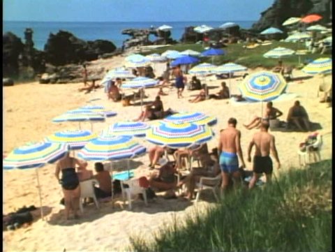 ST. GEORGE, BERMUDA, 1994, Umbrellas and swimmers on beach, Tobacco Bay