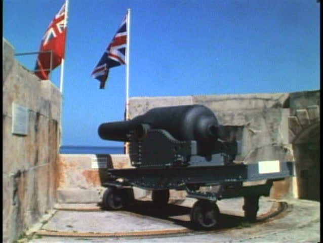 ST. GEORGE, BERMUDA, 1994, WWI cannon, flags, St. Catherine