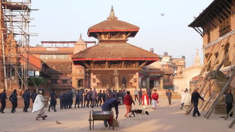 BHAKTAPUR, KATHMANDU, NEPAL - 18 Armed police officers and soldiers wearing uniform training. Communist Party power, maoist policeman security guard. Daily life, oriental ancient city after earthquake
