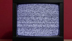 No signal just noise on two vintage TV set, closeup of screen, loopable