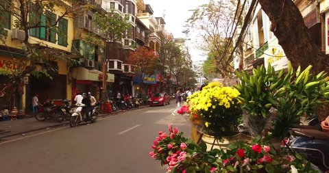 HANOI,VIETNAM-FEBRUARY 19,2019: Unidentified peoples working at 36 streets old quarters in Hanoi, Vietnam. This is landmark of food, market and shopping in Hanoi. Movement camera shot.