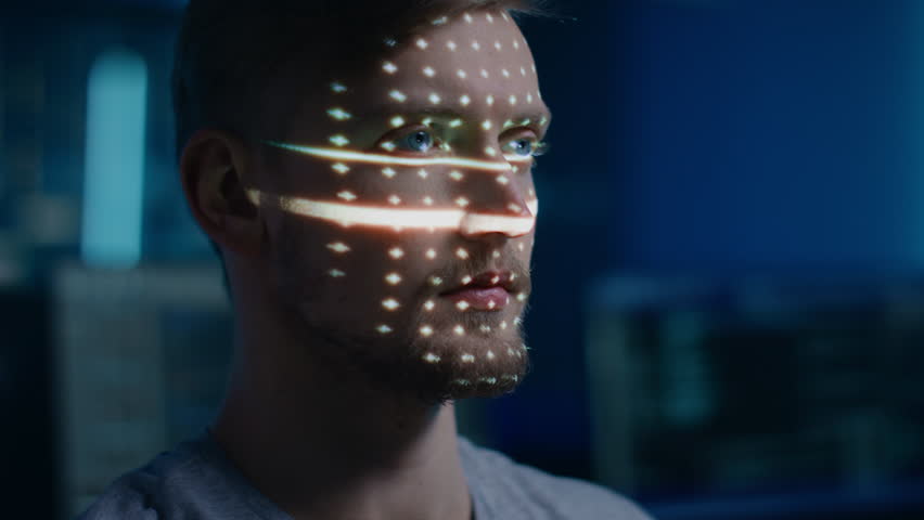 Handsome Young Caucasian Man is Identified by Biometric Facial Recognition Scanning Process. Futuristic Concept: Projector Identifies Individual by Illuminating Face by Dots and Scanning with Laser Royalty-Free Stock Footage #1024873967