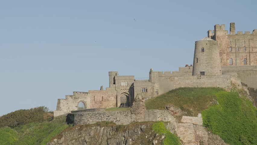 Bamburgh Castle from beach, Northumberland, England, United Kingdom, Europe