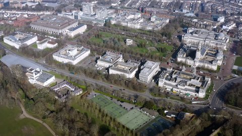 Cardiff University and University of Wales aerial view ft. National Museum, City Hall, Welsh Government building, Crown Court around Alexandra Gardens with campus and college panorama in Wales, UK 4K