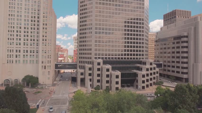 Ascending shot, showing downtown Saint Louis from above, with skyscrapers.