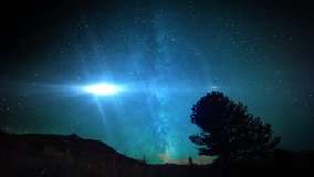 A UFO flies in the night sky, overtaking the observer. Possible abduction scenario.  	 - Powered by Shutterstock - Get 15% off with code: PIKWIZARD15