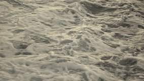Great seascape scenic with large foam waves from moving speedboat . Slow motion, Full HD video, 240fps, 1080p.