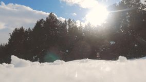 human feet go in deep snow winter. slow motion video. man traveler with backpack walks in the snow forest winter. overcoming difficulties concept lifestyle problems difficult path to success concept