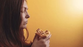 Piece Pizza . happy girl eating lifestyle a slice of pizza concept. woman hungry eats a slice of pizza. slow motion video. pizza fast food concept
