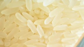 Rice for cooking. Unusual camera movement from close-up to general video plan